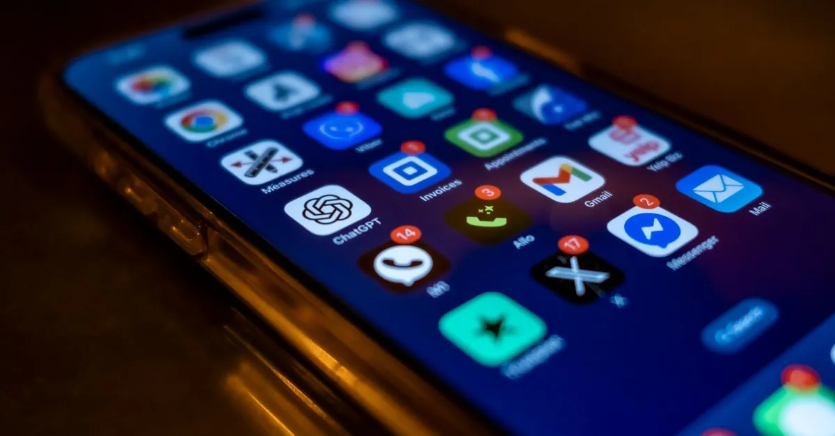 Laptop and smartphone screens showing corporate messages and emails being turned into integrated tasks.