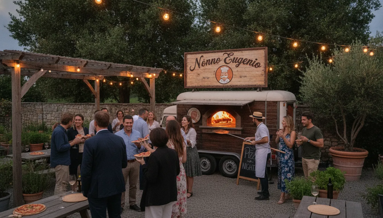 Evento noturno ao ar livre com forno Nonno Eugenio e convidados desfrutando de uma experiência de rodizio de pizza artesanal.